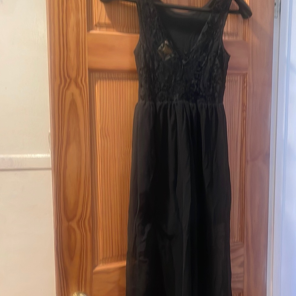 Black jumpsuit back lace pants are wide leg